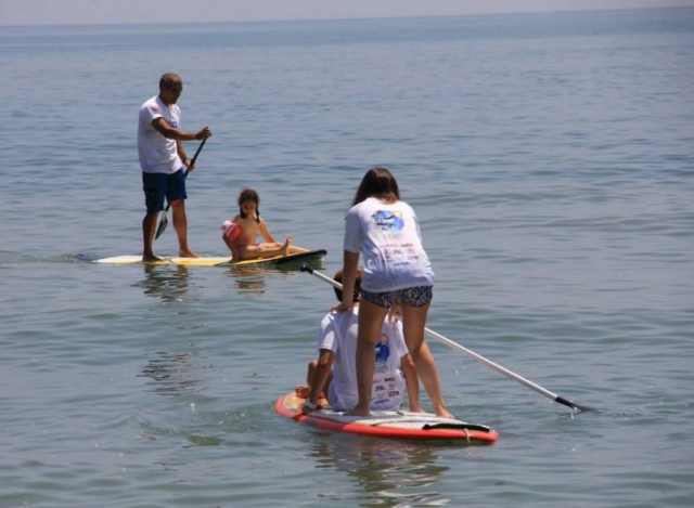 Remando en sup con los peques